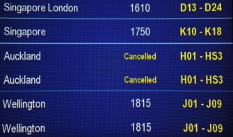 AGP - The Sydney International Airport departure screen shows a Qantas flight to Auckland in New Zealand cancelled notice (C) on June 12, 2011. AGP - The Sydney International Airport departure screen shows a Qantas flight to Auckland in New Zealand cancelled notice (C) on June 12, 2011.