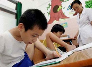 AO child victims in a class at the Peace Village in Ho Chi Minh City. AO child victims in a class at the Peace Village in Ho Chi Minh City.
