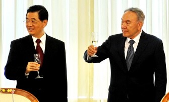 AFP - Kazakh President Nursultan Nazarbayev (R) and his visiting Chinese counterpart Hu Jintao (L) raise their glasses in a toast during a document signing ceremony in Astana, on June 13, 2011. AFP - Kazakh President Nursultan Nazarbayev (R) and his visiting Chinese counterpart Hu Jintao (L) raise their glasses in a toast during a document signing ceremony in Astana, on June 13, 2011.