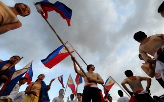 AFP file - Students wave Philippine flags as they perform a cultural dance during the celebration of the 113th anniversary of the proclamation of Philippine Independence at the Quirino Grand stand in Manila on June 12, 2011. AFP file - Students wave Philippine flags as they perform a cultural dance during the celebration of the 113th anniversary of the proclamation of Philippine Independence at the Quirino Grand stand in Manila on June 12, 2011.