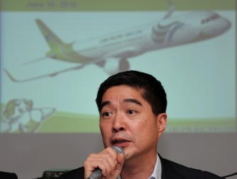 AFP - Cebu Pacific chief executive Lance Gokongwei speaks during a press conference in Manila on June 16, 2011. AFP - Cebu Pacific chief executive Lance Gokongwei speaks during a press conference in Manila on June 16, 2011.