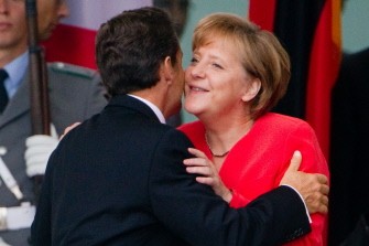 German Chancellor Angela Merkel welcomes French President Nicolas Sarkozy in front of the Chancellery in Berlin on June 17, 2011. German Chancellor Angela Merkel welcomes French President Nicolas Sarkozy in front of the Chancellery in Berlin on June 17, 2011.