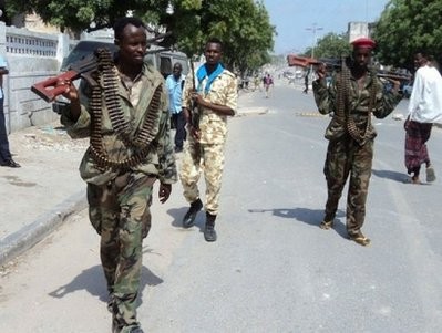 Somali security forces members patrol the streets of Waberi district in Mogadishu. Somali security forces members patrol the streets of Waberi district in Mogadishu.