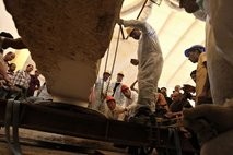 Egyptian workers remove a rock from the burial site of the second Sun Ship for King Khufu Egyptian workers remove a rock from the burial site of the second Sun Ship for King Khufu