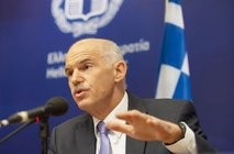 Greek Prime Minister George Papandreou addresses a press conference at the end of a summit of the EU Greek Prime Minister George Papandreou addresses a press conference at the end of a summit of the EU