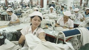Workers at a garment company. The government has decided to increase maximum wages for labour employed by domestic and foreign enterprises. Workers at a garment company. The government has decided to increase maximum wages for labour employed by domestic and foreign enterprises.
