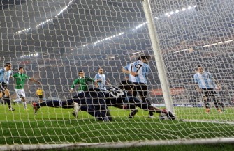 AFP - Argentine goalkeeper Sergio Romero tries to catch the ball during the match against Bolivia AFP - Argentine goalkeeper Sergio Romero tries to catch the ball during the match against Bolivia