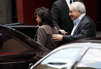 AFP - Dominique Strauss-Kahn and his wife Anne Sinclair leave the apartment where they are staying in New York July 2, 2011. AFP - Dominique Strauss-Kahn and his wife Anne Sinclair leave the apartment where they are staying in New York July 2, 2011.