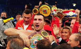 AFP - Wladimir Klitschko holds up a belt after the fight against British WBA champion David Haye AFP - Wladimir Klitschko holds up a belt after the fight against British WBA champion David Haye