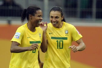 Brazil's defender Rosana (L) celebrates with her teammate Brazil's striker Marta after scoring the 2-0 during the match Brazil vs Norway in Wolfsburg on July 3, 2011. AFP Brazil's defender Rosana (L) celebrates with her teammate Brazil's striker Marta after scoring the 2-0 during the match Brazil vs Norway in Wolfsburg on July 3, 2011. AFP