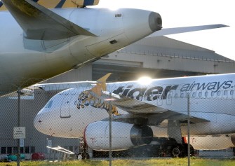 AFP (FILES) In a file picture taken on July 2, 2011 a Tiger Airways plane sits on the tarmac at Melbourne Airport after aviation regulators grounded budget carrier for what they described as a serieous risk to safety. AFP (FILES) In a file picture taken on July 2, 2011 a Tiger Airways plane sits on the tarmac at Melbourne Airport after aviation regulators grounded budget carrier for what they described as a serieous risk to safety.