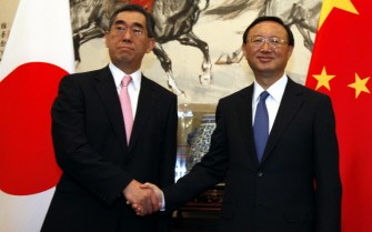 AFP - Japanese Foreign Minister Takeaki Matsumoto (L) shakes hands with Chinese Foreign Minister Yang Jiechi (R) as they pose for a picture as Matsumoto visits the Diaoyutai state guesthouse in Beijing on July 4, 2011. AFP - Japanese Foreign Minister Takeaki Matsumoto (L) shakes hands with Chinese Foreign Minister Yang Jiechi (R) as they pose for a picture as Matsumoto visits the Diaoyutai state guesthouse in Beijing on July 4, 2011.
