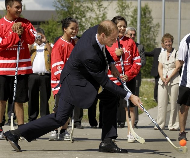 Prince William, the Duke of Cambridge, takes a shot as he visits kids playing street hockey during a welcome ceremony in Yellowknife, Canada as the Royal couple continue their Royal Tour of Canada Tuesday, July 5, 2011 Prince William, the Duke of Cambridge, takes a shot as he visits kids playing street hockey during a welcome ceremony in Yellowknife, Canada as the Royal couple continue their Royal Tour of Canada Tuesday, July 5, 2011