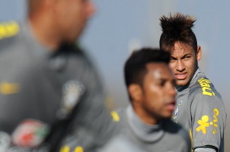 AFP - Brazilian footballer Neymar (R) looks on during training session in Campana, Buenos Aires, Argentina during the 2011 Argentina Copa America on July 7, 2011. Brazil will face Paraguay July 9. AFP - Brazilian footballer Neymar (R) looks on during training session in Campana, Buenos Aires, Argentina during the 2011 Argentina Copa America on July 7, 2011. Brazil will face Paraguay July 9.