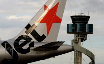 AFP - In this file picture taken 26 October 2007, a plane from Qantas airline budget carrier Jetstar (L) is shown taxiing past the air traffic control tower (R) at Sydney Airport. AFP - In this file picture taken 26 October 2007, a plane from Qantas airline budget carrier Jetstar (L) is shown taxiing past the air traffic control tower (R) at Sydney Airport.