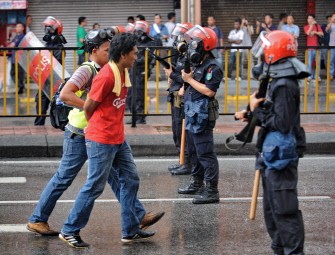 A detained protester is led away by plainclothed Malaysian policeman at a mass rally calling for electoral reform in Kuala Lumpur on July 9, 2011. A detained protester is led away by plainclothed Malaysian policeman at a mass rally calling for electoral reform in Kuala Lumpur on July 9, 2011.