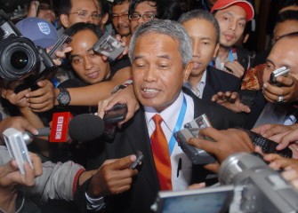 AFP - Djohar Arifin Husin (C) answer journalists questions after he was elected the new chairman of The Indonesian Football Association AFP - Djohar Arifin Husin (C) answer journalists questions after he was elected the new chairman of The Indonesian Football Association