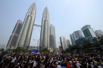 AFP - Protesters take part in a mass rally calling for electoral reform in front of Malaysia's iconic twin towers in Kuala Lumpur on July 9, 2011. AFP - Protesters take part in a mass rally calling for electoral reform in front of Malaysia's iconic twin towers in Kuala Lumpur on July 9, 2011.
