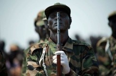 A South Sudanese soldier holds his weapon as he stands to attention during a parade rehearsal in JubaPhoto: AFP A South Sudanese soldier holds his weapon as he stands to attention during a parade rehearsal in JubaPhoto: AFP
