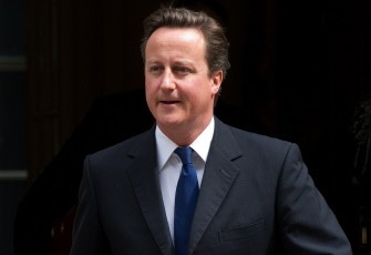 AFP - British Prime Minister David Cameron leaves 10 Downing Street in London, on July 13, 2011, as he prepares to address the weekly Prime Ministers Questions at the House of Commons. AFP - British Prime Minister David Cameron leaves 10 Downing Street in London, on July 13, 2011, as he prepares to address the weekly Prime Ministers Questions at the House of Commons.