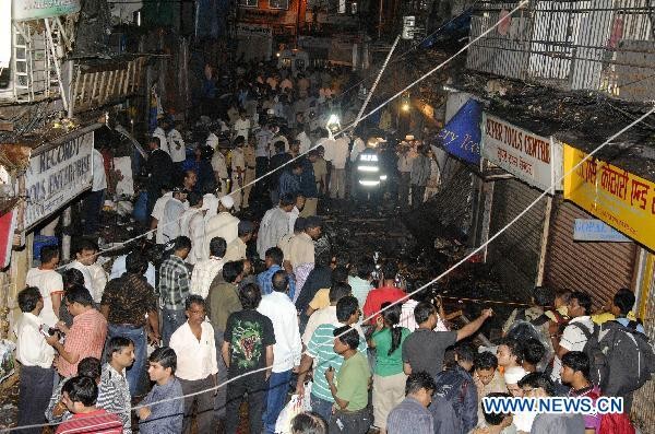 People gather at the blast site in south Mumbai's Zaveri Bazaar, near the famous Mumbadevi temple, India, July 13, 2011 People gather at the blast site in south Mumbai's Zaveri Bazaar, near the famous Mumbadevi temple, India, July 13, 2011