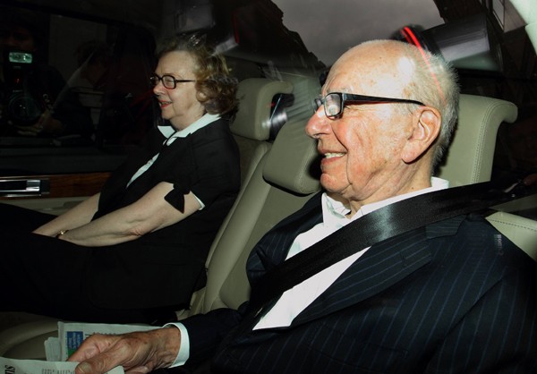 News Corporation CEO Rupert Murdoch is driven away from his flat in central London July 13, 2011. News Corporation CEO Rupert Murdoch is driven away from his flat in central London July 13, 2011.
