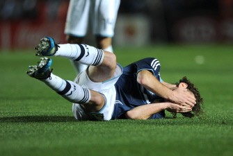 AFP - Argentine defender Gabriel Milito reacts on the groun during their quarter-final match against Uruguay AFP - Argentine defender Gabriel Milito reacts on the groun during their quarter-final match against Uruguay