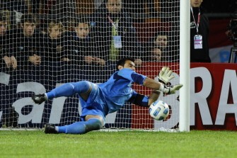 Paraguayan goalkeeper Justo Villar stops the penalty from Brazilian defender Thiago Silva during the penalty shoot-out. AFP Paraguayan goalkeeper Justo Villar stops the penalty from Brazilian defender Thiago Silva during the penalty shoot-out. AFP