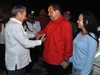 Handout picture released by www.cubadebate.cu of Cuban President Raul Castro greeting his Venezuelan counterpart Hugo Chavez (C) with his daughter Rosa Virginia (R) upon arrival at the Jose Marti international airport in Havana early morning on July 17, 2011. Handout picture released by www.cubadebate.cu of Cuban President Raul Castro greeting his Venezuelan counterpart Hugo Chavez (C) with his daughter Rosa Virginia (R) upon arrival at the Jose Marti international airport in Havana early morning on July 17, 2011.