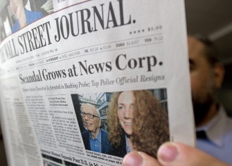 AFP - The Wall Street Journal is viewed on July 18, 2011 in Washington,DC. The News Corp.-owned Wall Street Journal blasted critics Monday for double standards and insisted that the phone-tapping scandal in Britain should not tarnish all of Rupert Murdoch's media empire. AFP - The Wall Street Journal is viewed on July 18, 2011 in Washington,DC. The News Corp.-owned Wall Street Journal blasted critics Monday for double standards and insisted that the phone-tapping scandal in Britain should not tarnish all of Rupert Murdoch's media empire.
