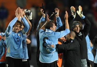 AFP - Uruguayan players celebrate at the end of their 2011 Copa America semi-final football match against Peru AFP - Uruguayan players celebrate at the end of their 2011 Copa America semi-final football match against Peru