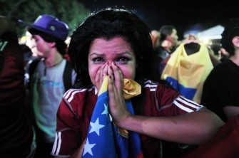 A woman in Venezuela's Caracas reacts following the 2011 Copa America semi-final between Paraguay and Venezuela on July 21, 2011 A woman in Venezuela's Caracas reacts following the 2011 Copa America semi-final between Paraguay and Venezuela on July 21, 2011
