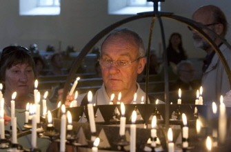 People light candles in Oslo Cathedral on July 23, 2011, to pay tribute to the victims of twin attacks at the government headquarters building in Oslo and on a youth camp, Norway's deadliest post-war tragedy. People light candles in Oslo Cathedral on July 23, 2011, to pay tribute to the victims of twin attacks at the government headquarters building in Oslo and on a youth camp, Norway's deadliest post-war tragedy.
