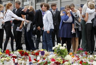 AFP - Grieving members of the public embrace after a "mass for sorrow and hope" at Oslo's Cathedral on July 24, 2011. AFP - Grieving members of the public embrace after a "mass for sorrow and hope" at Oslo's Cathedral on July 24, 2011.