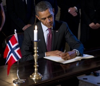 US President Barack Obama signs a book of condolences at the Norwegian Ambassador's residence in Washington, DC, July 26, 2011 US President Barack Obama signs a book of condolences at the Norwegian Ambassador's residence in Washington, DC, July 26, 2011
