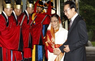 South Korean President Lee Myung-bak (R) greets visiting Indian President Pratibha Devisingh Patil before their summit at the presidential Blue House in Seoul July 25, 2011 South Korean President Lee Myung-bak (R) greets visiting Indian President Pratibha Devisingh Patil before their summit at the presidential Blue House in Seoul July 25, 2011