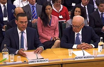 (AFP FILES) This file image of a screen grab image taken in London on July 19, 2011, shows News Corporation Chief Rupert Murdoch (Front R) and his son James (Front L) giving evidence to a Parliamentary Select Committee on the phone hacking scandal (AFP FILES) This file image of a screen grab image taken in London on July 19, 2011, shows News Corporation Chief Rupert Murdoch (Front R) and his son James (Front L) giving evidence to a Parliamentary Select Committee on the phone hacking scandal