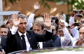 AFP - Norwegian Prime Minister Jens Stoltenberg waves to the crowd as he leaves after a memorial service at Central Jamaat Ahle Sunnat mosque in Oslo on July 29, 2011 AFP - Norwegian Prime Minister Jens Stoltenberg waves to the crowd as he leaves after a memorial service at Central Jamaat Ahle Sunnat mosque in Oslo on July 29, 2011