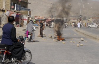 Pakistani Shiites burn tires to protest against the killing of Shiites in Quetta on July 30, 2011 after a passenger van carrying Shiite Muslims was attacked by gunmen. Pakistani Shiites burn tires to protest against the killing of Shiites in Quetta on July 30, 2011 after a passenger van carrying Shiite Muslims was attacked by gunmen.