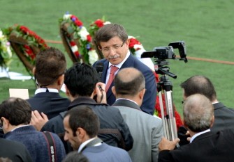 Turkish Foreign Minister Ahmet Davutoglu (C) is pictured as he attends on August 1, 2011 in Trondheim, the funeral of Gizam Dogan, a 17-year-old Turkish victim of the massacre on the Utoeya island as Norwegian Prime Minister Jens Stoltenberg paid tribute today to his fellow citizens for a dignified response to the twin bomb and shooting attacks that killed 77 people on July 22. Turkish Foreign Minister Ahmet Davutoglu (C) is pictured as he attends on August 1, 2011 in Trondheim, the funeral of Gizam Dogan, a 17-year-old Turkish victim of the massacre on the Utoeya island as Norwegian Prime Minister Jens Stoltenberg paid tribute today to his fellow citizens for a dignified response to the twin bomb and shooting attacks that killed 77 people on July 22.