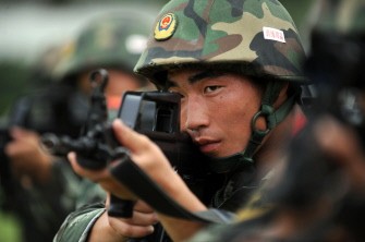 AFP - This photo taken on August 3, 2011 shows paramilitary soldiers training in Bozhou in east China's Anhui province. AFP - This photo taken on August 3, 2011 shows paramilitary soldiers training in Bozhou in east China's Anhui province.