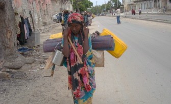 AFP - A Somali displaced woman arrives in Mogadishu on August 3, 2011 after fleeing from southern Somalia regions because of the famine AFP - A Somali displaced woman arrives in Mogadishu on August 3, 2011 after fleeing from southern Somalia regions because of the famine
