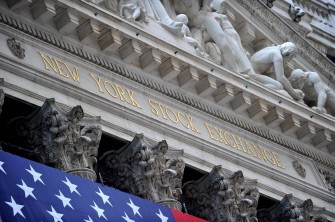 Sign over an entrance to the New York Stock Exchange is seen on August 5, 2011. The Dow Jones Industial Average closed up 60.93 points at 11,444.61 Sign over an entrance to the New York Stock Exchange is seen on August 5, 2011. The Dow Jones Industial Average closed up 60.93 points at 11,444.61