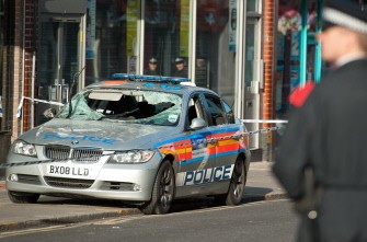 AFP - A damaged police vehicle is pictured in Enfield, north London, following a second night of disturbances in London, on August 8, 2011 AFP - A damaged police vehicle is pictured in Enfield, north London, following a second night of disturbances in London, on August 8, 2011