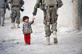 AFP - An Afghan girl greets a joint patrol of US troops from the Charlie Company, 2-87 Infantry, 3rd Brigade Combat Team and Afghan National Army soldiers at Kandalay village in the southern Afghan province of Kandahar on August 8, 2011 AFP - An Afghan girl greets a joint patrol of US troops from the Charlie Company, 2-87 Infantry, 3rd Brigade Combat Team and Afghan National Army soldiers at Kandalay village in the southern Afghan province of Kandahar on August 8, 2011
