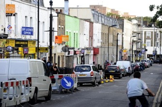 AFP - A boy rides his bicycle down Clarence Road in Hackney, London, on August 11, 2011, the scene of rioting on August 8 AFP - A boy rides his bicycle down Clarence Road in Hackney, London, on August 11, 2011, the scene of rioting on August 8