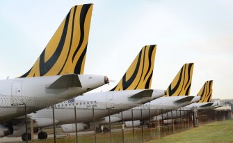 AFP - Tiger Airways planes sit on the tarmac as the budget carrier resumed flights in Australia AFP - Tiger Airways planes sit on the tarmac as the budget carrier resumed flights in Australia