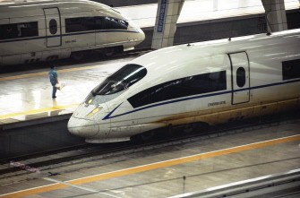 AFP - A picture taken on August 11, 2011 show a CRH380BL bullet train sitting at Beijing south railway station. AFP - A picture taken on August 11, 2011 show a CRH380BL bullet train sitting at Beijing south railway station.