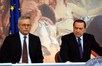 AFP - Italy's Prime Minister Silvio Berlusconi (R) and Italy's Finance Minister Giulio Tremonti attend a press conference in Rome on August 12, 2011, ahead of a cabinet meeting called for the adoption of a new austerity programme. AFP - Italy's Prime Minister Silvio Berlusconi (R) and Italy's Finance Minister Giulio Tremonti attend a press conference in Rome on August 12, 2011, ahead of a cabinet meeting called for the adoption of a new austerity programme.