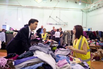 AFP - British Opposition Labour Party Leader Ed Miliband (L) talks with workers at the Tottenham Green Leisure centre in east London, on August 12, 2011, where donated items such as food and clothing have been collected for victims of the recent riots and looting. AFP - British Opposition Labour Party Leader Ed Miliband (L) talks with workers at the Tottenham Green Leisure centre in east London, on August 12, 2011, where donated items such as food and clothing have been collected for victims of the recent riots and looting.